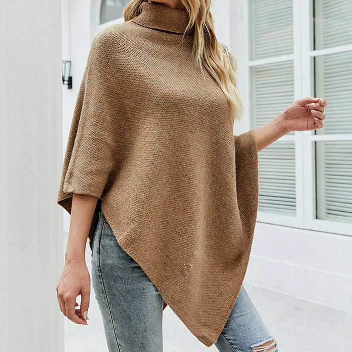 Bruine poncho met knopen