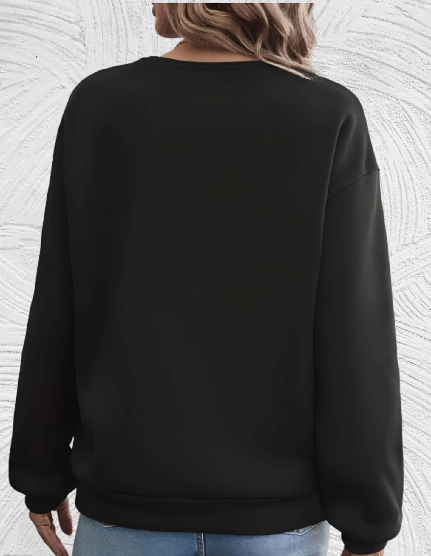 Almira - Oversized sweater met ronde hals en 'share your light'-statement op de voorkant