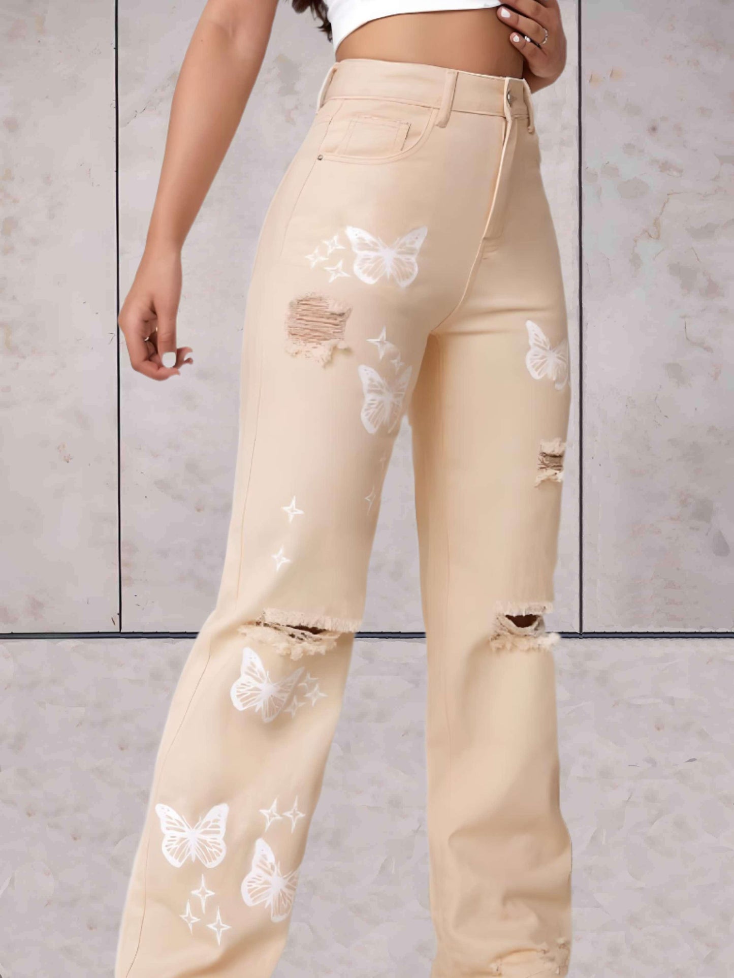 Ciara - Gescheurde jeans wijde pijpen met vlinders patroon