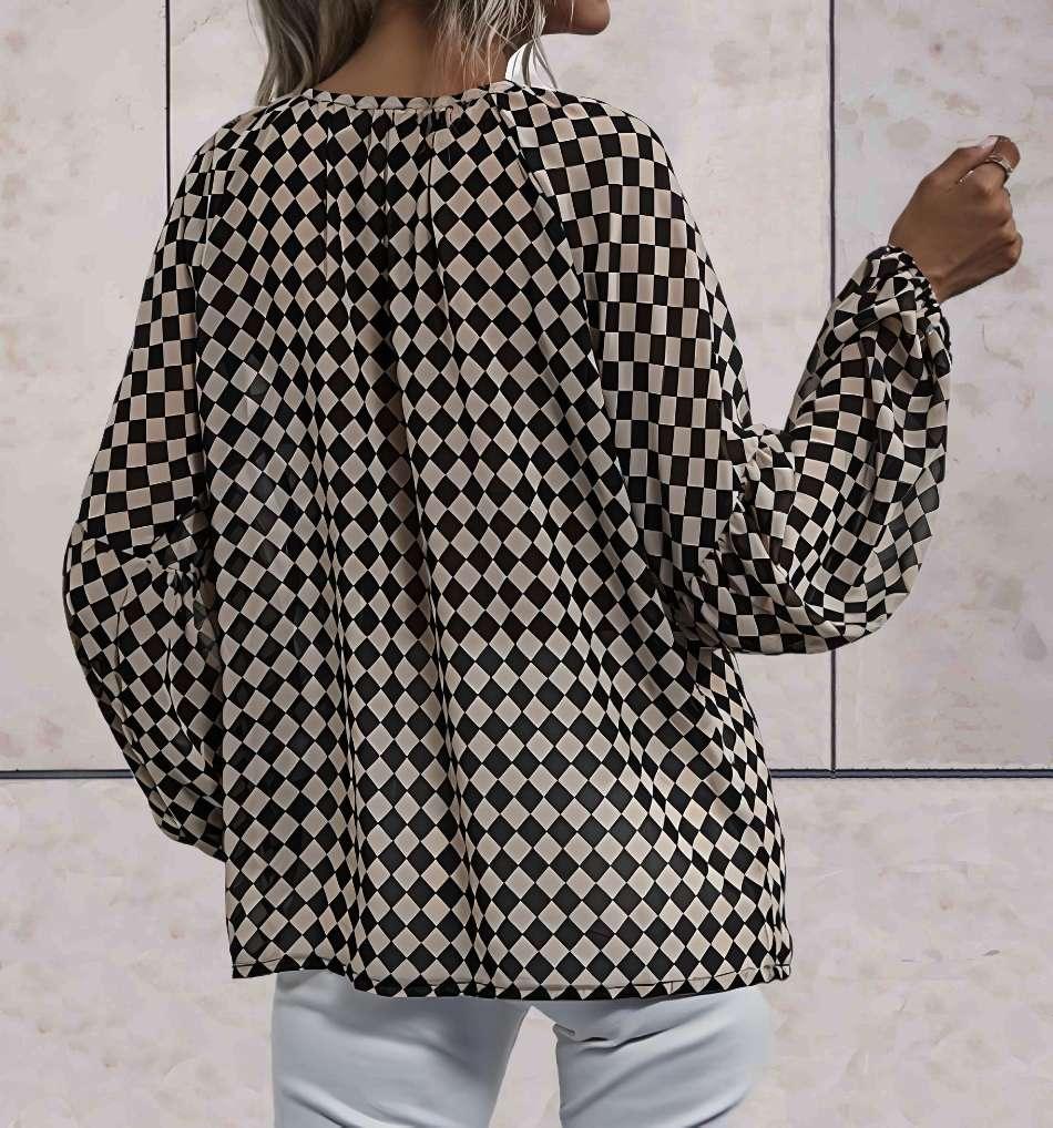 Lottie - Oversized top met lange mouwen en diagonaal geruit ontwerp in zwart en huidskleur