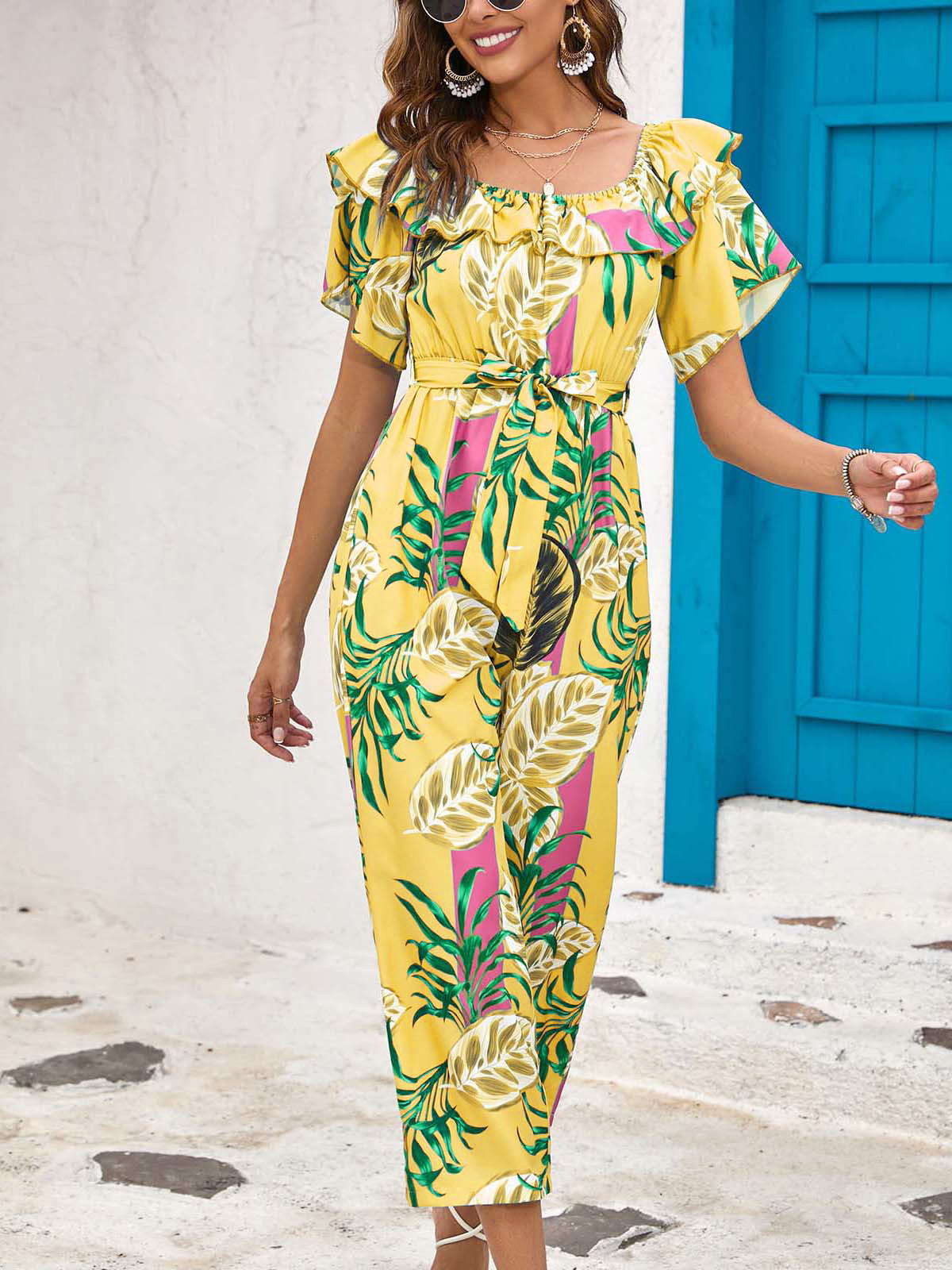 Gele jumpsuit met print