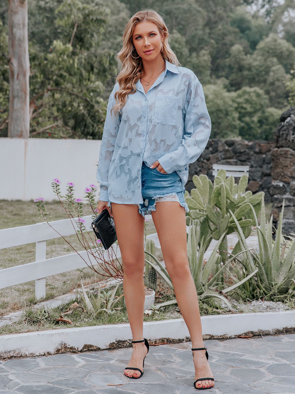 Blauwe blouse met patroon