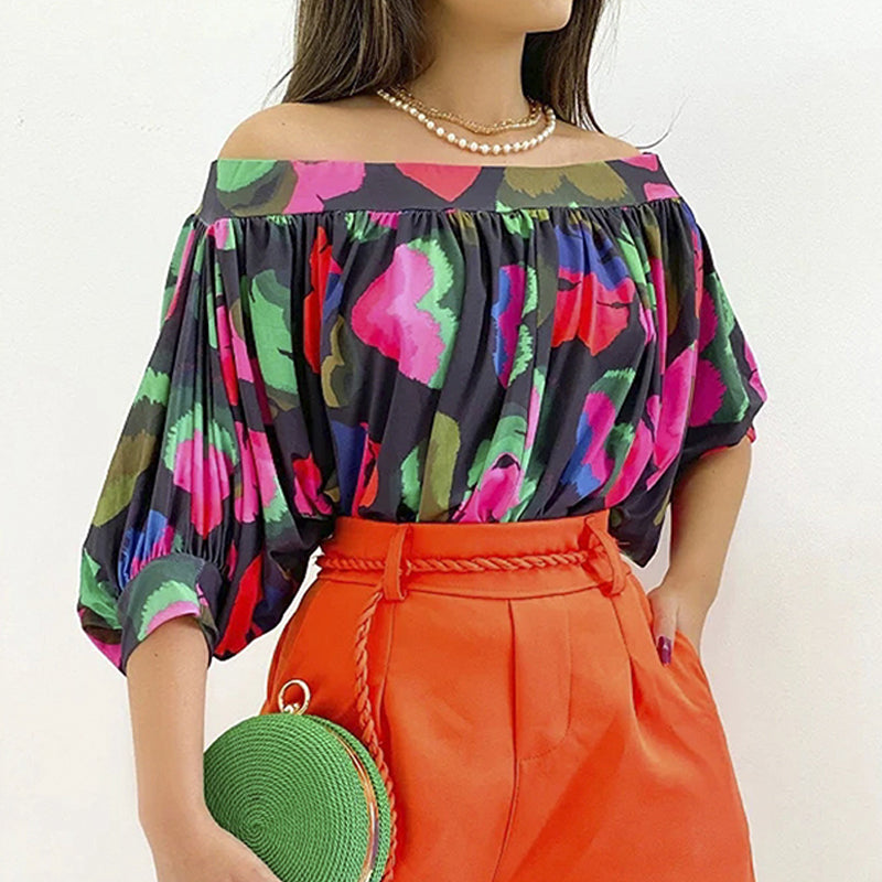 Zwarte off-shoulder blouse met gekleurde print