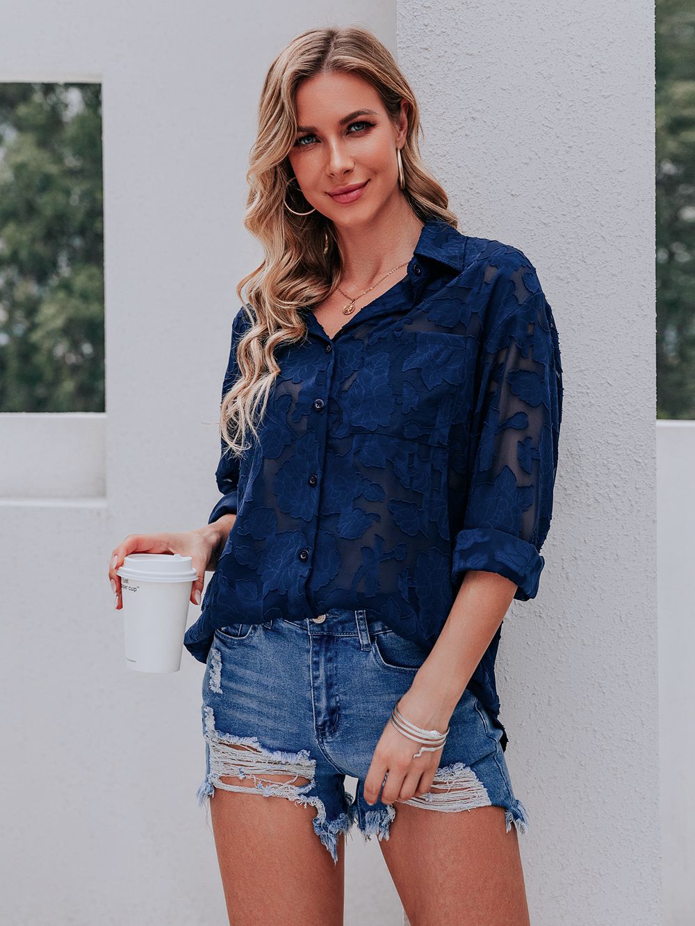 Donkerblauwe blouse met patroon