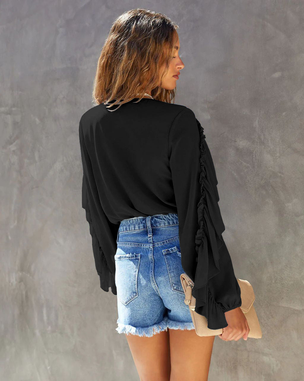 Zwarte body met ruffles