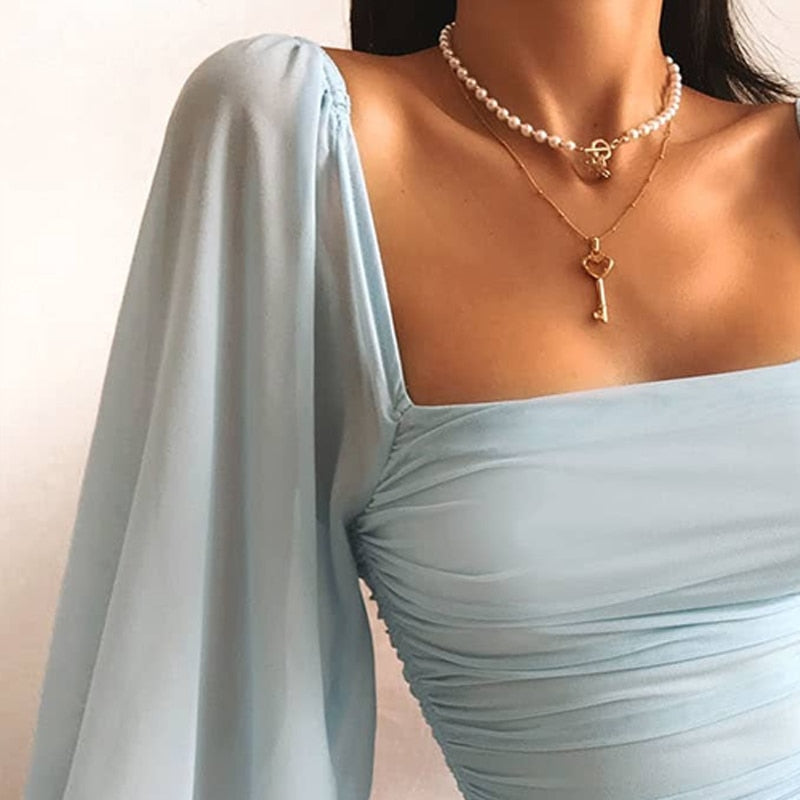 Lichtblauwe mini jurk