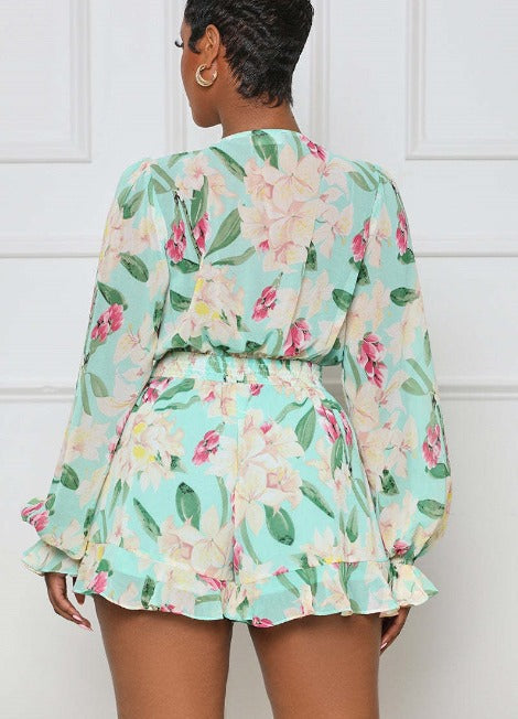 Mintgroene playsuit met bloemenprint