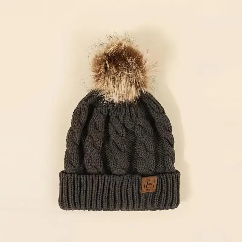 Warme muts met Pompom