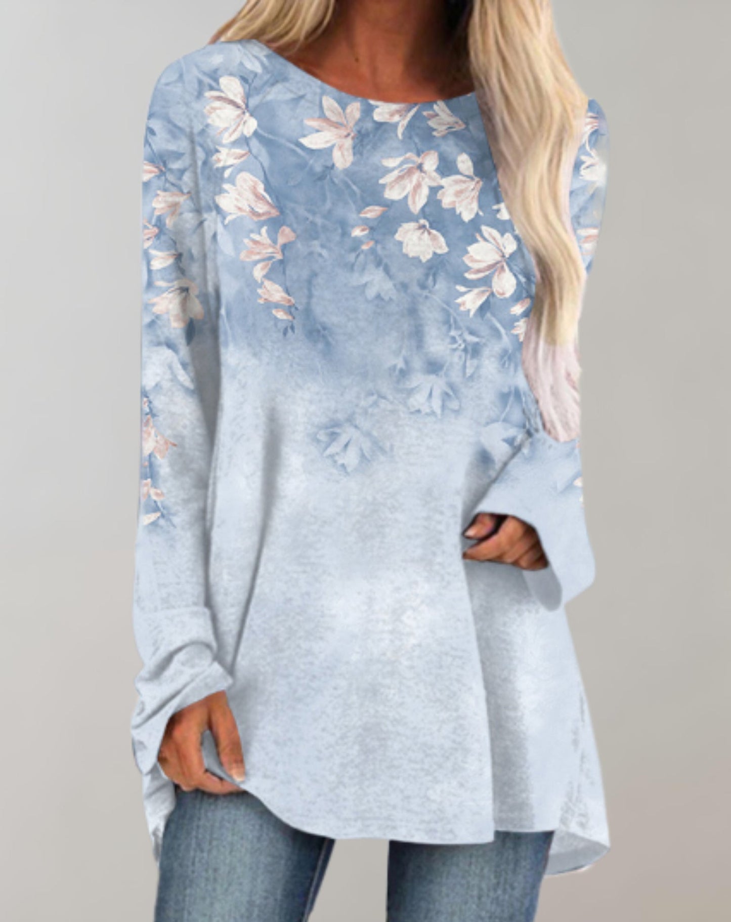 Klarissa | Lange zwierige oversized sweater met bloemdessin en zijzak