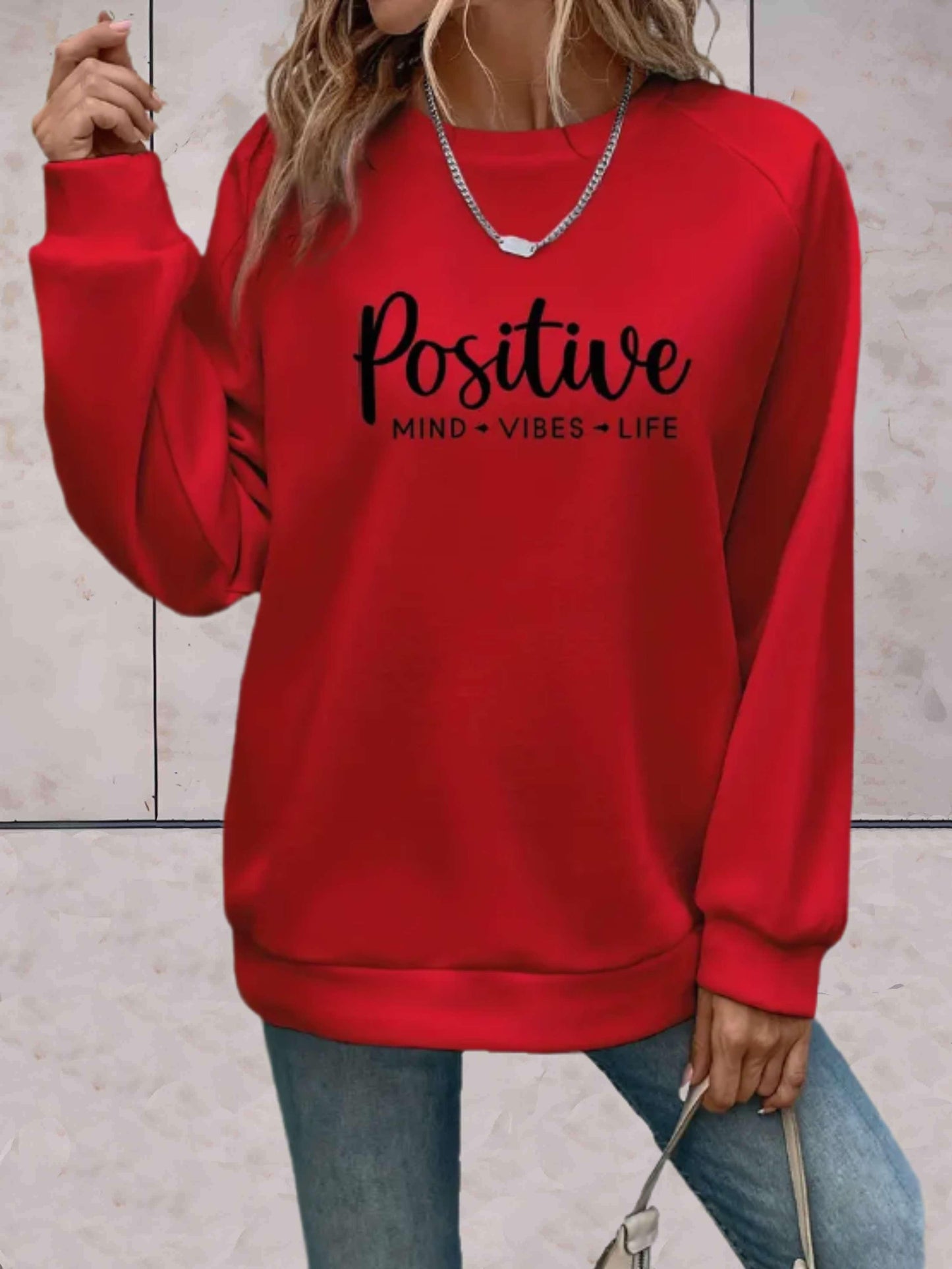Adeline - Oversized trui met ronde hals en motiverende print