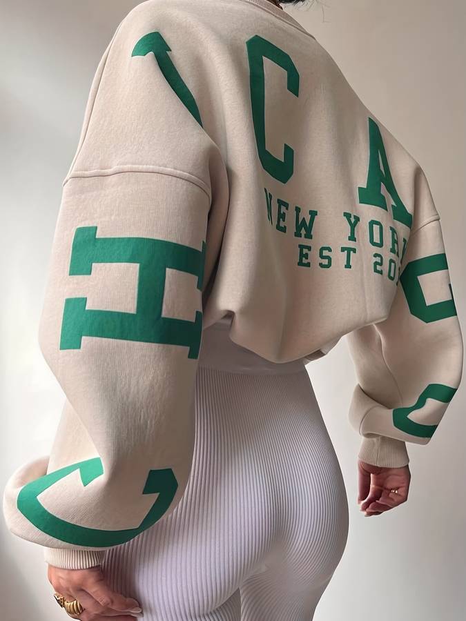 Beige sweater met tekst