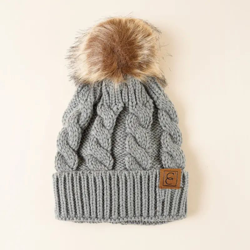 Warme muts met Pompom