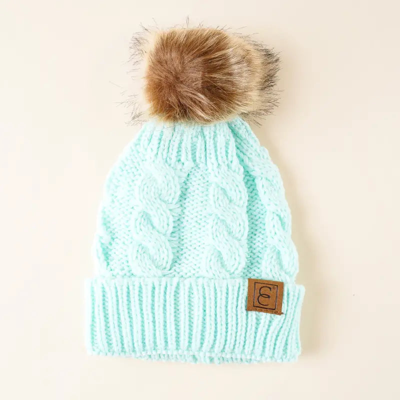 Warme muts met Pompom