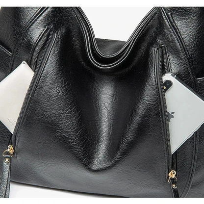 Bellabags | ruime vintage schoudertas