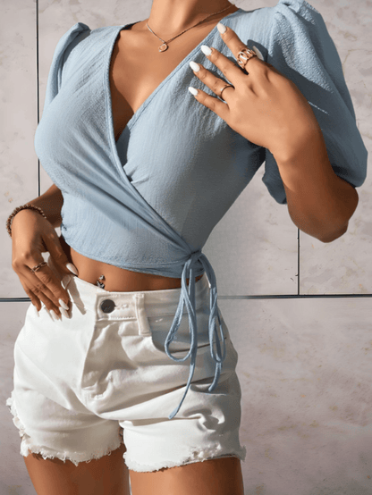 Aubrey - Licht blauwe crop top met wijde opgevulde mouwen