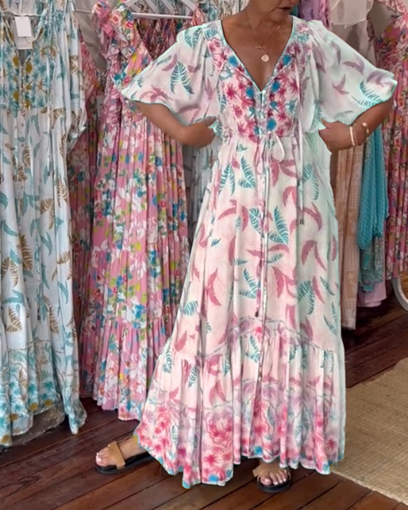 Amita - Maxi-jurk voor dames met een bladprint en een elegante V-hals