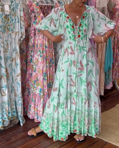 Amita - Maxi-jurk voor dames met een bladprint en een elegante V-hals