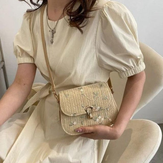 Liana | Geborduurde schoudertas van stro