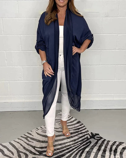 Joan  | Zijdeachtige losse top met V-hals - Stralend de Zomer in