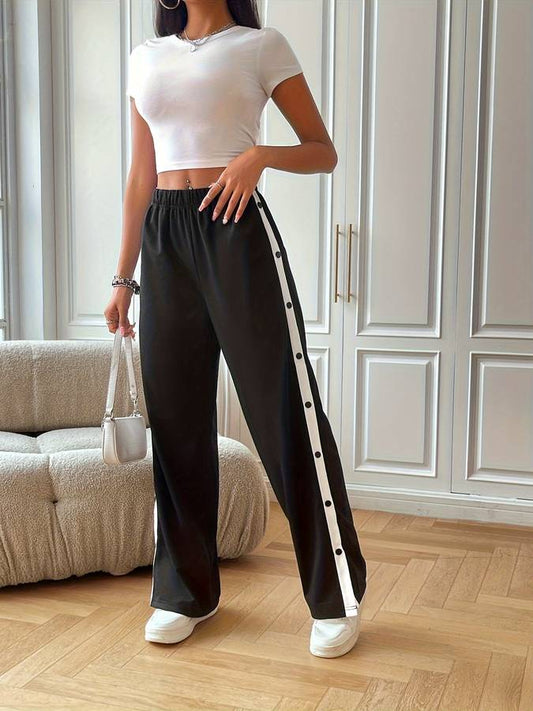 Broek met elastische tailleband en knopen voor dames