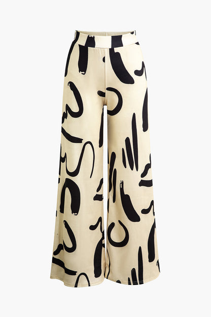 Vera | Broek met wijde pijpen en abstracte print