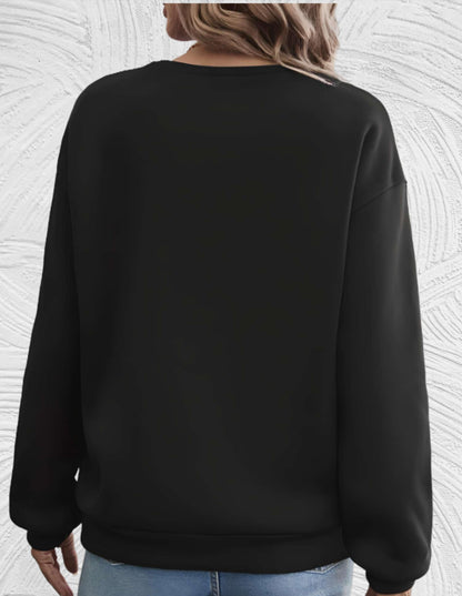 Almira - Oversized sweater met ronde hals en 'share your light'-statement op de voorkant