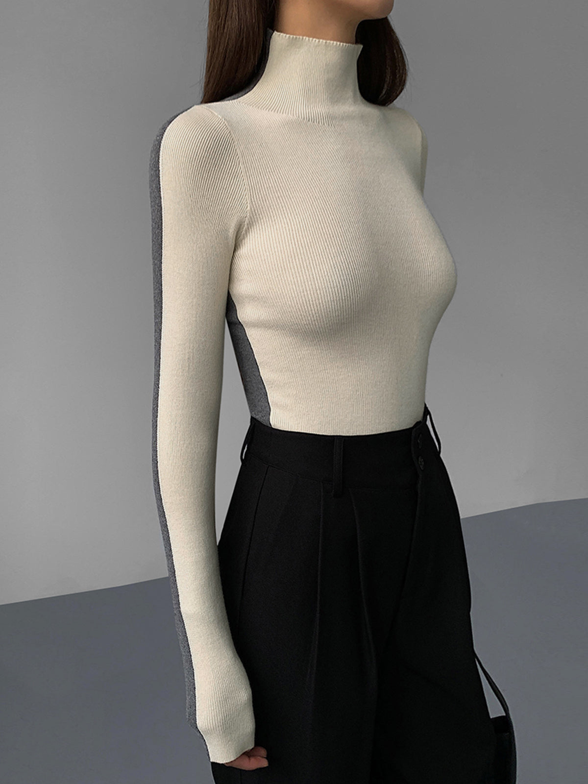 BEAUVOGUE - Tweekleurige dubbelzijdige gebreide top met lange mouwen