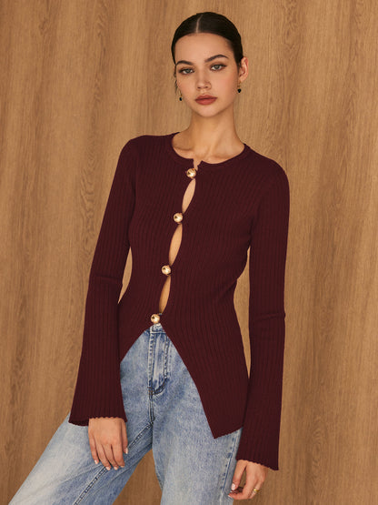 BEAUVOGUE - Gouden knoopsplit gebreide top