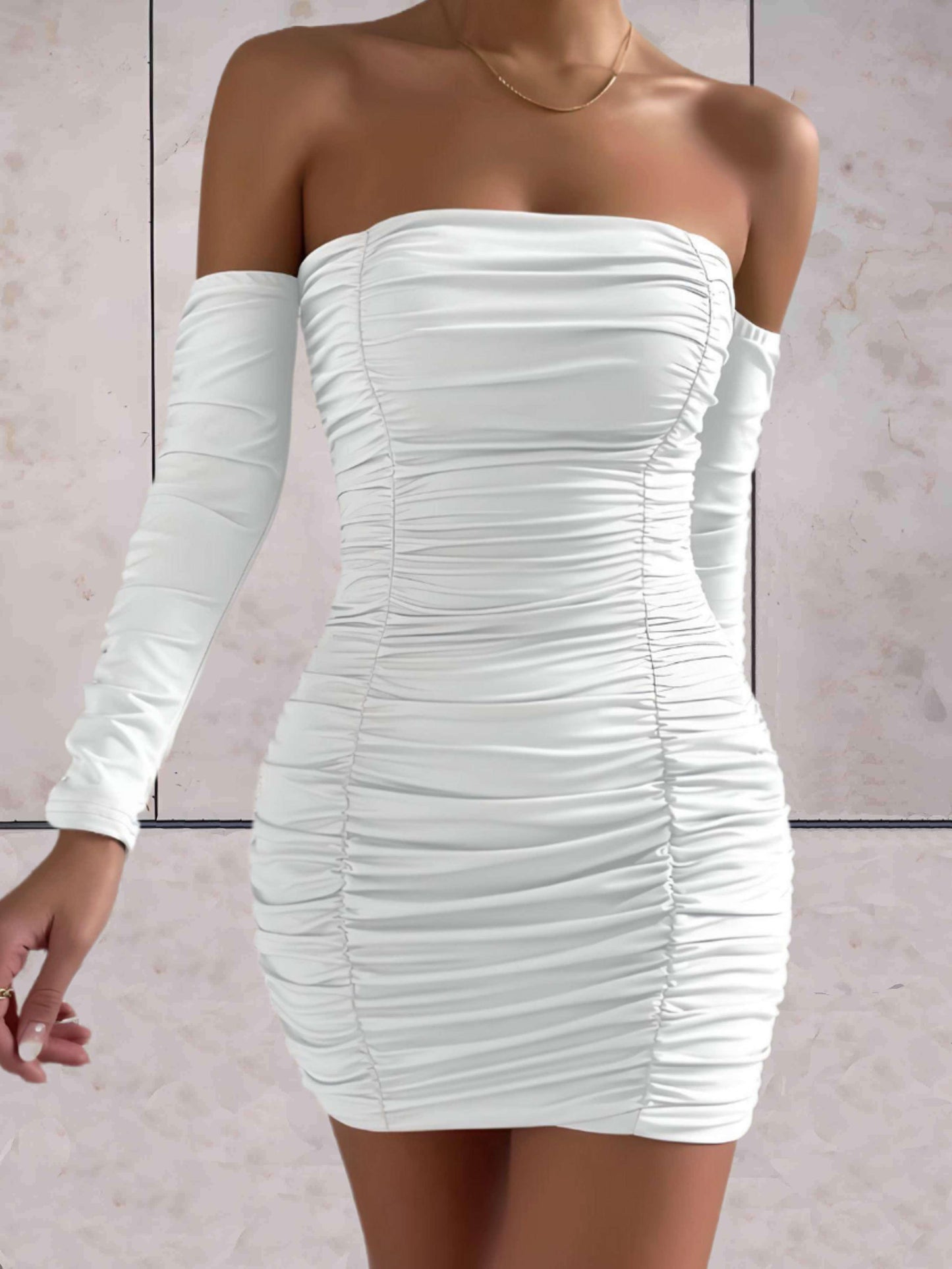 Joannah - Strakke mini geribbelde jurk open schouders lange mouwen