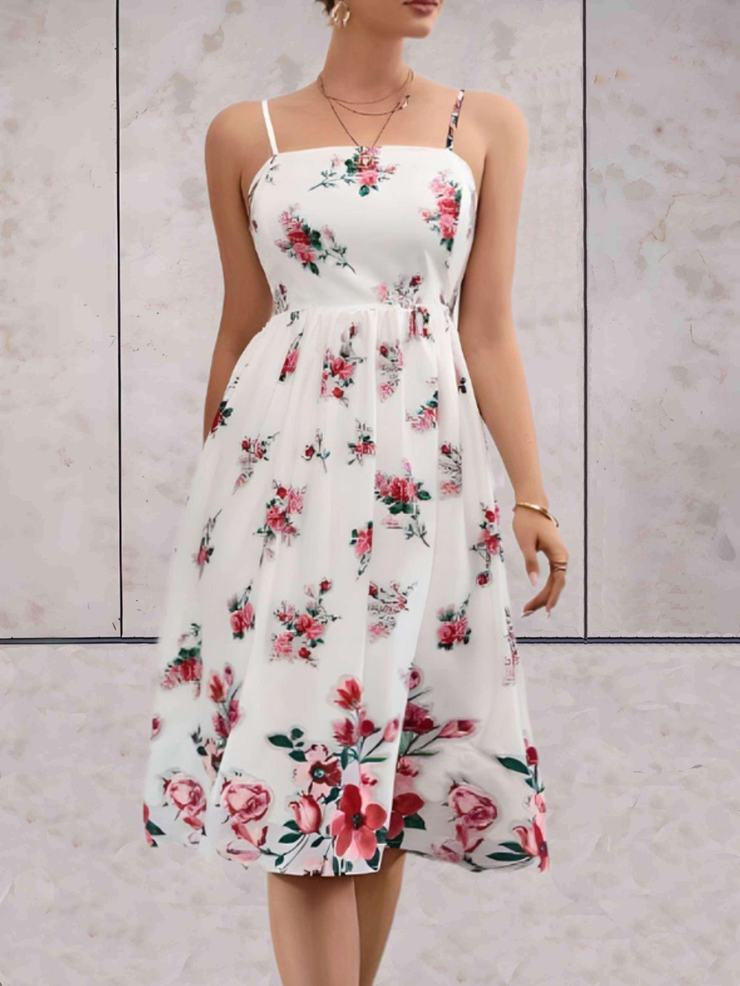 Alies - Wijde bloemen jurk met schouder straps in wit