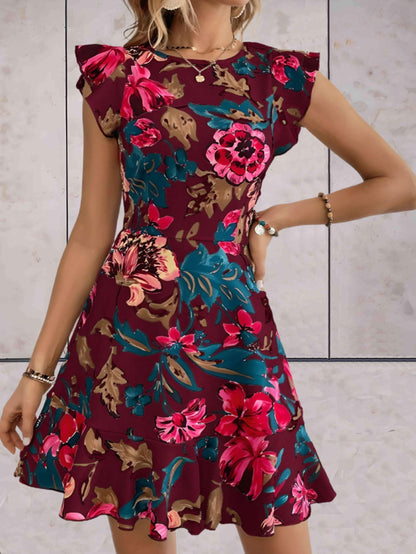 Ramona - stijlvolle gebloemde jurk met korte mouwen en ruches aan de mouwen en onderkant