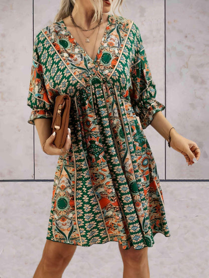 Roxie - stijlvolle boho jurk met halve mouwen in v-hals met kousenband onderaan de mouw