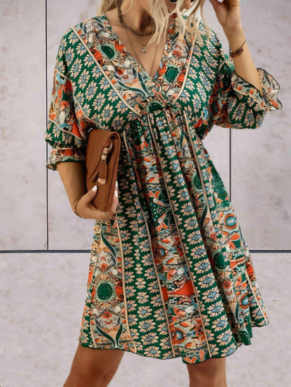 Roxie - stijlvolle boho jurk met halve mouwen in v-hals met kousenband onderaan de mouw