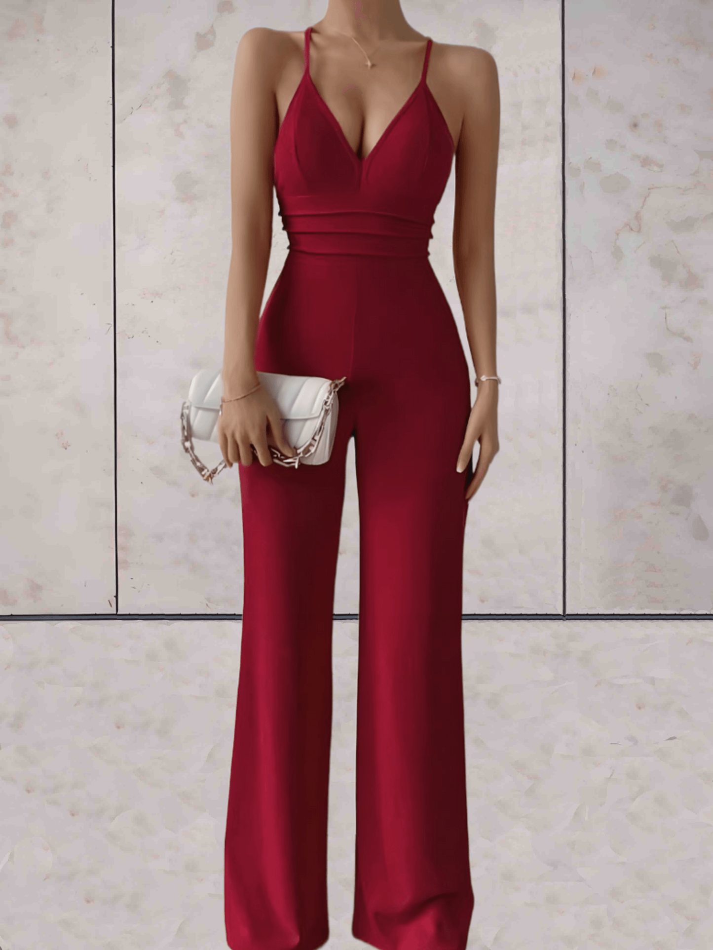 Brianna | Strakke en chique jumpsuit laag v-uitgesneden mouwloos, rugloos met wijde pijpen