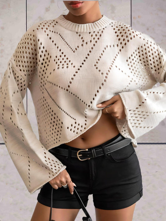 Evalina - Off white oversized sweater met ronde hals en abstract stippen dessin