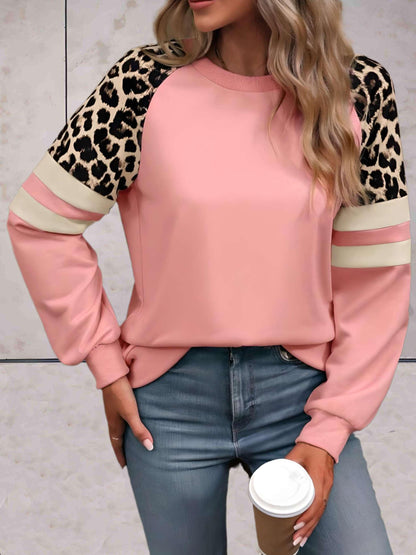 Ezra - Mooi aansluitende sweater met luipaardprint op de mouwen