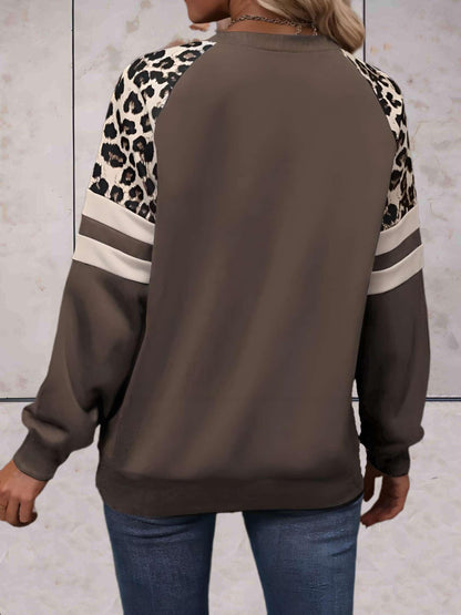 Ezra - Mooi aansluitende sweater met luipaardprint op de mouwen