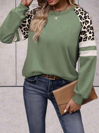 Ezra - Mooi aansluitende sweater met luipaardprint op de mouwen