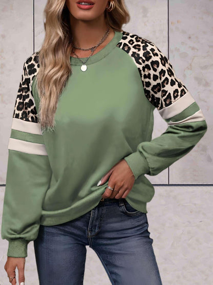 Ezra - Mooi aansluitende sweater met luipaardprint op de mouwen