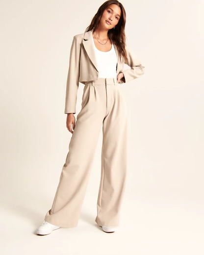Joycelyn - Getailleerde broek met wijde pijpen in beige