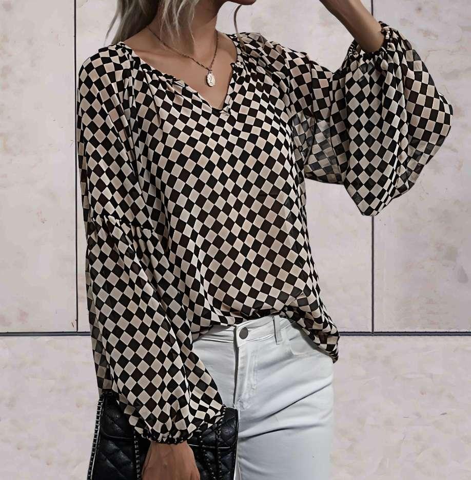 Lottie - Oversized top met lange mouwen en diagonaal geruit ontwerp in zwart en huidskleur