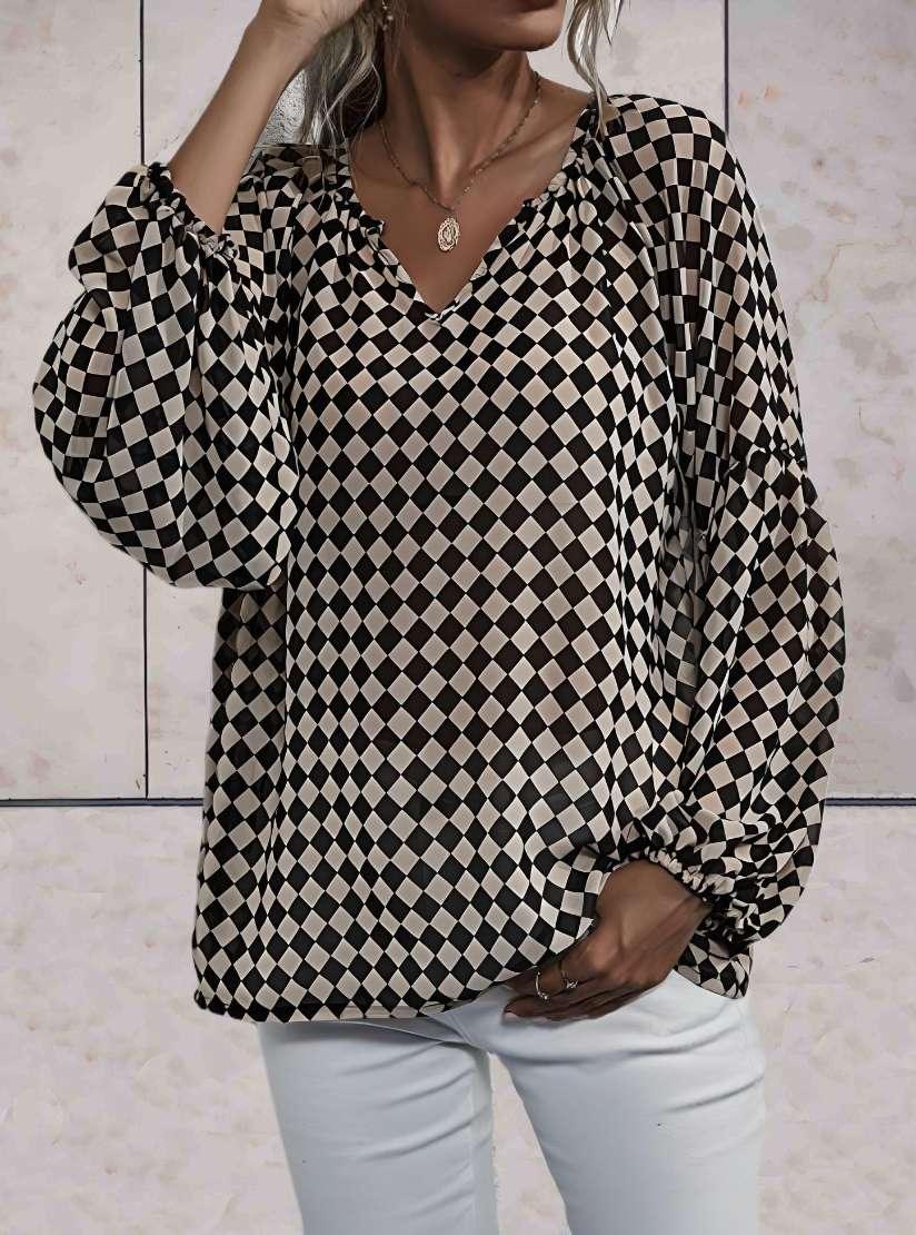 Lottie - Oversized top met lange mouwen en diagonaal geruit ontwerp in zwart en huidskleur