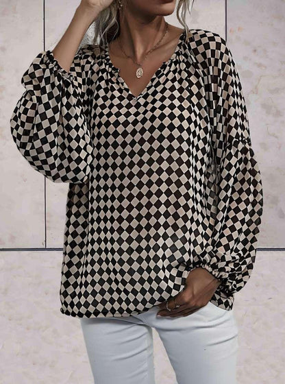 Lottie - Oversized top met lange mouwen en diagonaal geruit ontwerp in zwart en huidskleur