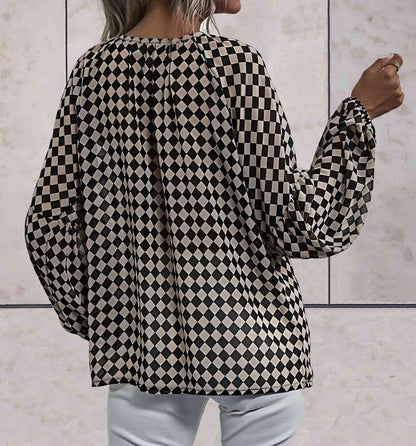 Lottie - Oversized top met lange mouwen en diagonaal geruit ontwerp in zwart en huidskleur