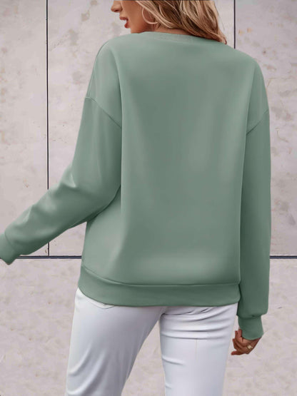 Madison -  Lange trui met liefde is alles wat je nodig hebt statement design vooraan