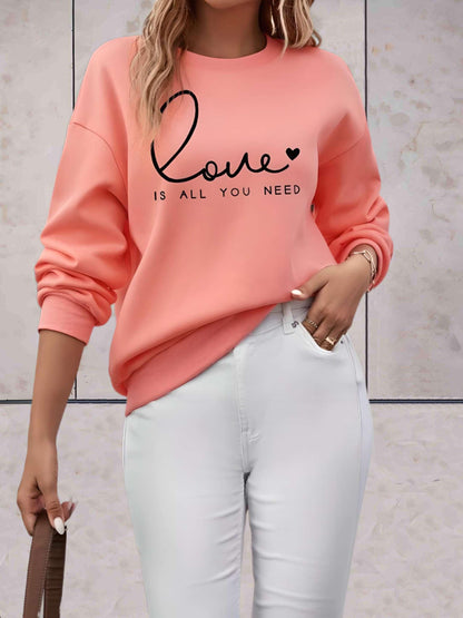 Madison -  Lange trui met liefde is alles wat je nodig hebt statement design vooraan