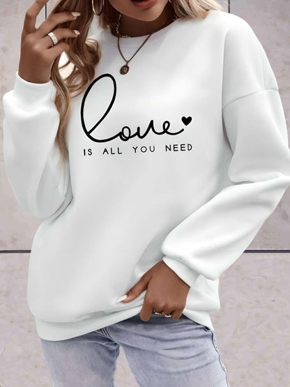 Madison -  Lange trui met liefde is alles wat je nodig hebt statement design vooraan