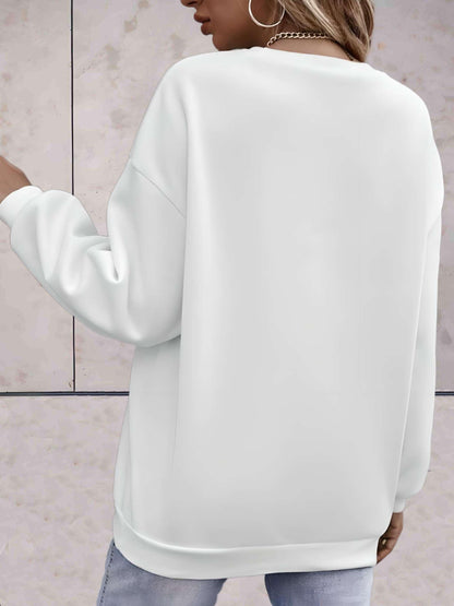 Madison -  Lange trui met liefde is alles wat je nodig hebt statement design vooraan