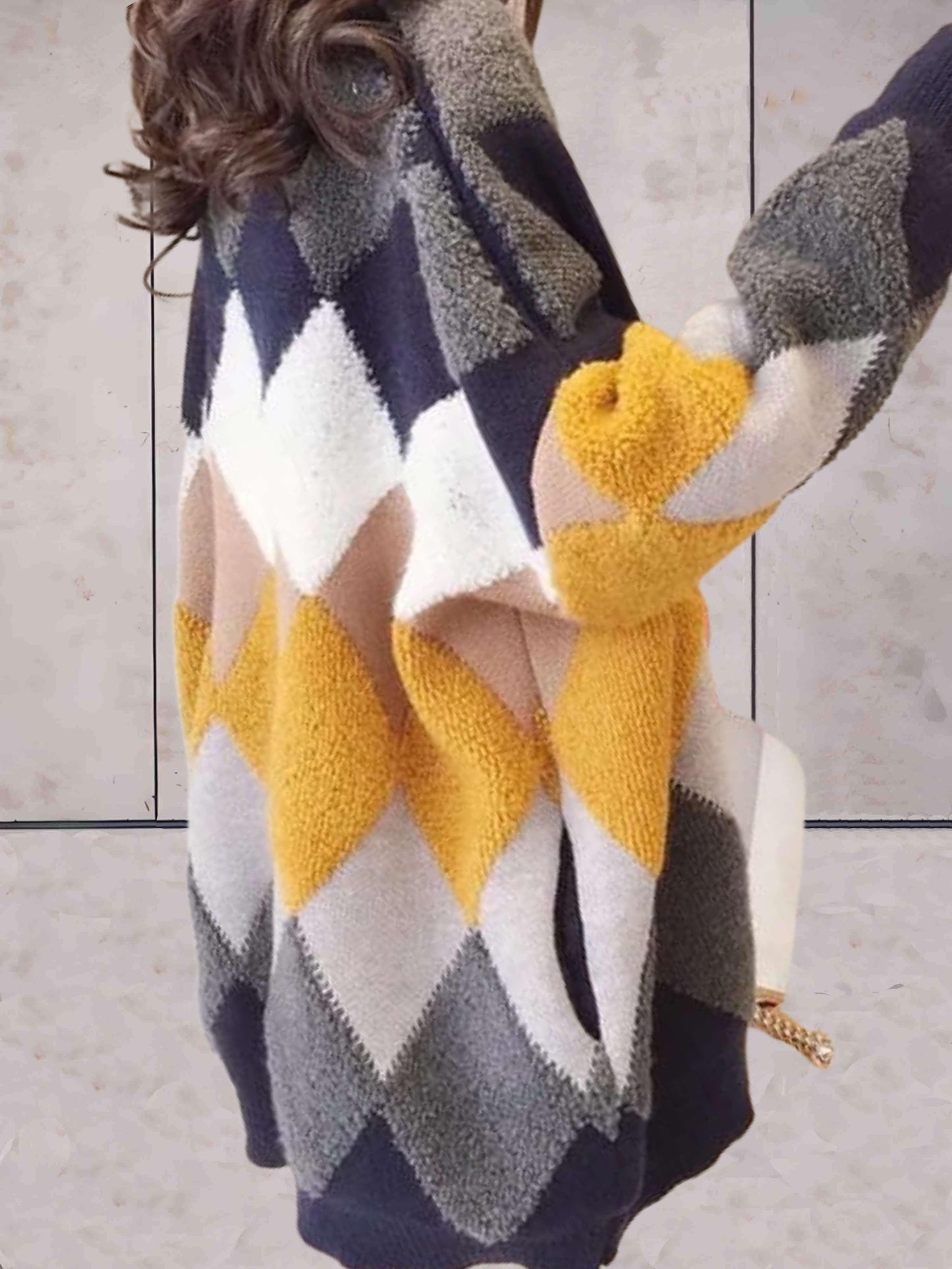 Myka | Nonchalante gebreide bonttrui met V-hals, knoopsluiting en ruitpatroon