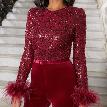 Jumpsuit met glitters en veren